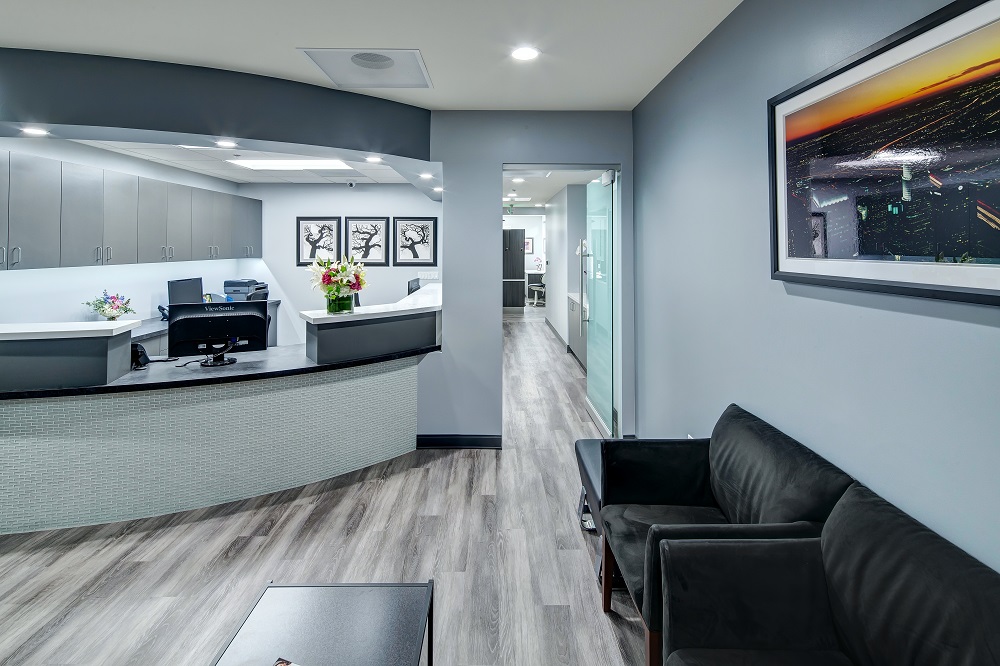 Welcoming reception desk and seating area at our Westlake Village practice